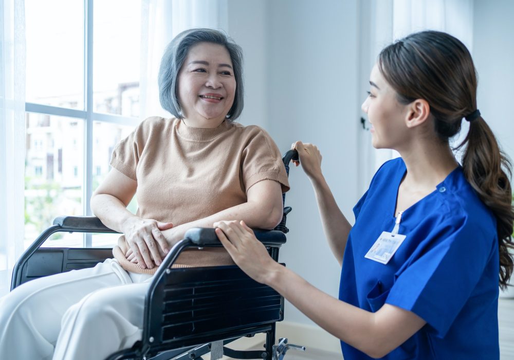 asian-nurse-take-care-senior-woman-on-wheelchair-at-nursing-home-care-.jpg